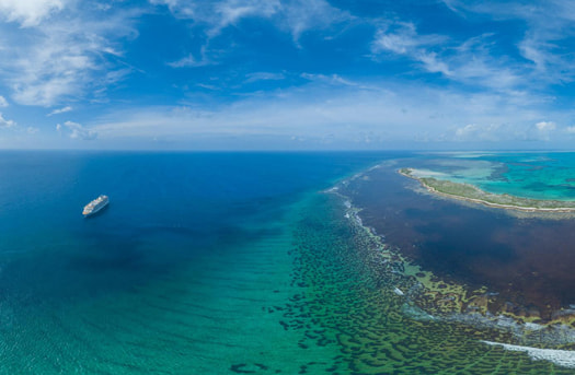 th678 aerial view of cruise next to coast